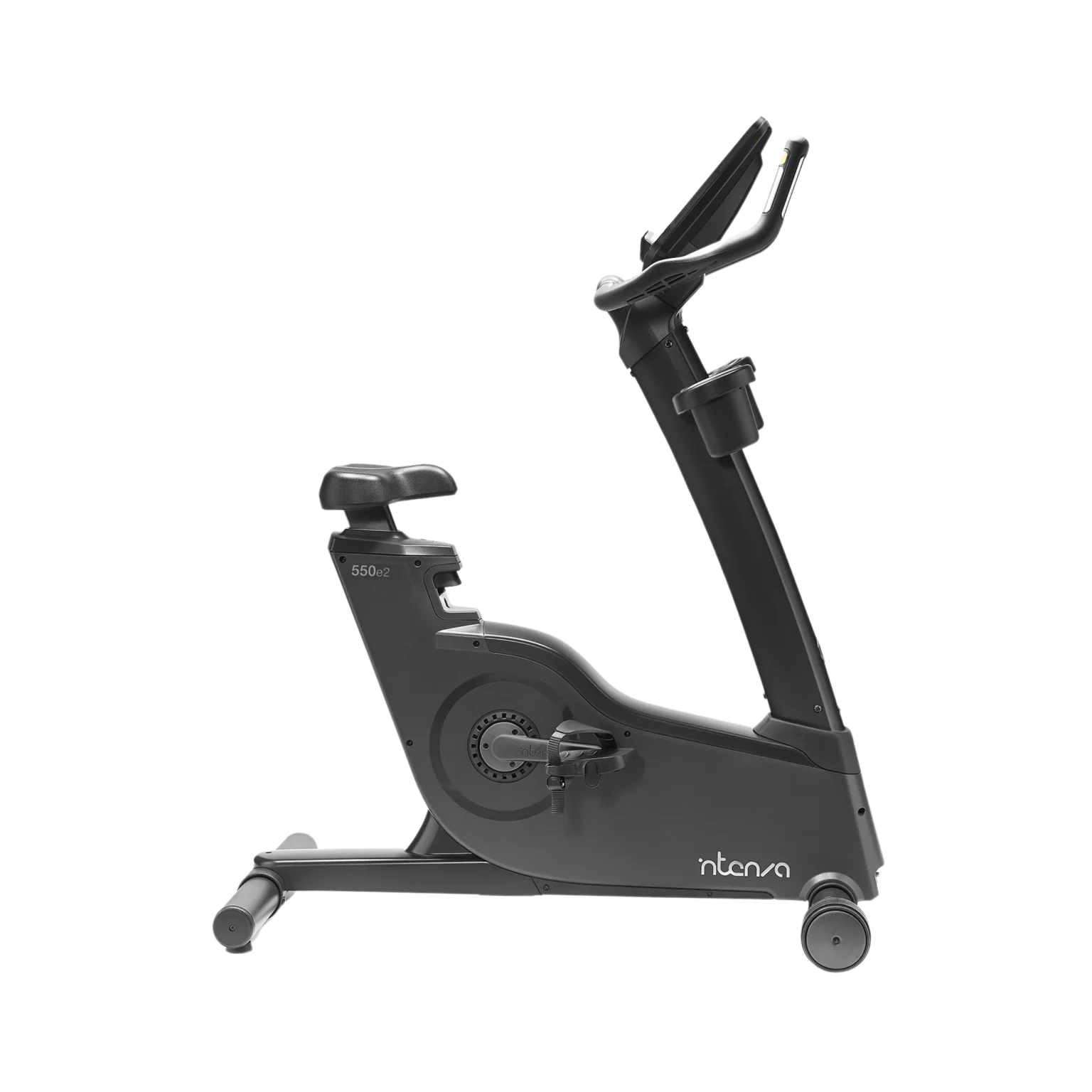 Person using the Intenza 550UBe2+ Upright Bike, demonstrating proper form and highlighting its comfortable and adjustable seat. A top choice for fitness in Dubai, UAE