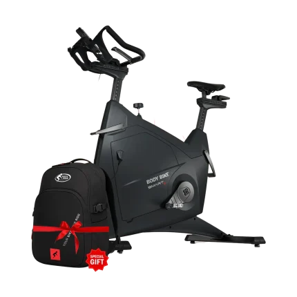 BODY BIKE SMART+ indoor cycle in a modern Dubai home gym, showcasing its sleek design and SMART Charge feature, ideal for fitness enthusiasts in the UAE.
