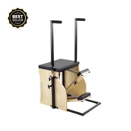he Merrithew Split Pedal Stability Chair with handles showcased in a bright Dubai fitness studio, highlighting its compact design and versatile functionality for Pilates and strength training in the UAE.