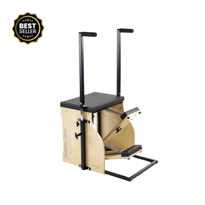 he Merrithew Split Pedal Stability Chair with handles showcased in a bright Dubai fitness studio, highlighting its compact design and versatile functionality for Pilates and strength training in the UAE.