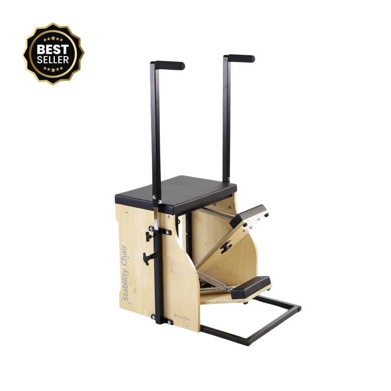 he Merrithew Split Pedal Stability Chair with handles showcased in a bright Dubai fitness studio, highlighting its compact design and versatile functionality for Pilates and strength training in the UAE.