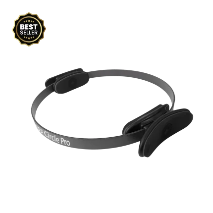 he Merrithew Fitness Circle Pro displayed in a bright Dubai Pilates studio, showcasing its robust spring steel ring and comfortable foam grips, ideal for intense workouts in the UAE.