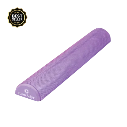 The Merrithew Foam Roller Deluxe 36inch - Half displayed in a bright Dubai fitness studio, showcasing its flat side for stability and textured surface for users in the UAE.