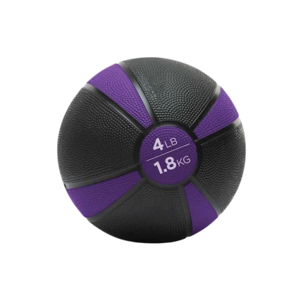 Merrithew Medicine Ball held in hand, showcasing its size and texture, perfect for strength training and core workouts in Dubai, UAE. Buy medicine ball online.