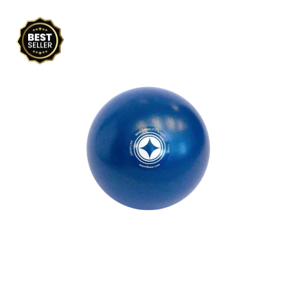 The Merrithew Mini Stability Ball in blue Small displayed in a bright Dubai home workout space, showcasing its compact size and versatility for various exercises in the UAE.