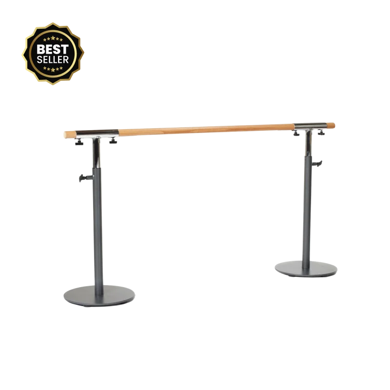 The Merrithew Stability Barre (6 ft, Gray) set up in a bright Dubai fitness studio, showcasing its adjustable height and suitability for group Barre classes in the UAE.