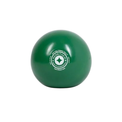 Merrithew Toning Ball held in hand, showcasing its size and texture, perfect for adding intensity to Pilates workouts in Dubai, UAE. Buy toning ball online