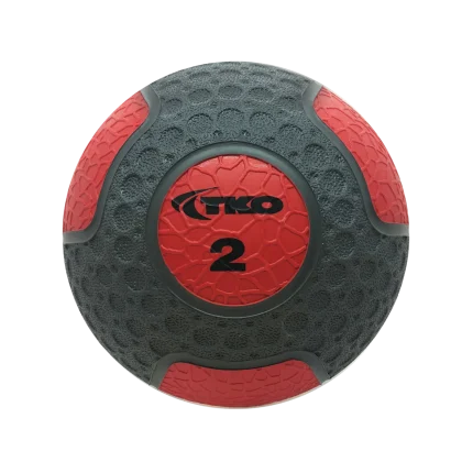 A TKO Rubber Medicine Ball in a Dubai-based gym, highlighting its durable rubber construction and easy-to-grip surface, perfect for strength training exercises in the UAE. This emphasizes durability and grip in Dubai.