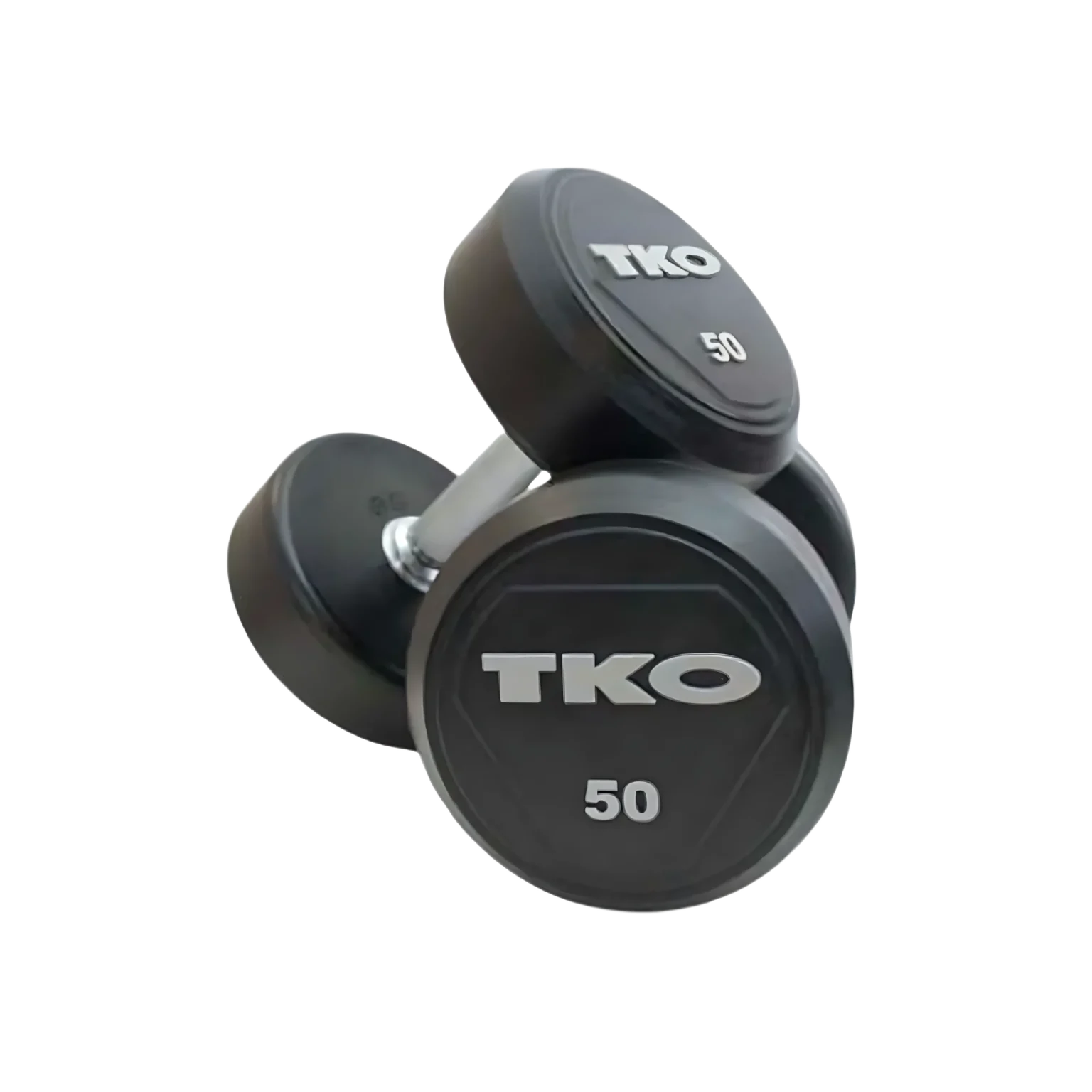TKO Solid Steel Rubber Dumbbell in a modern Dubai home gym, showcasing its durable construction and sleek design, perfect for strength training in the UAE.