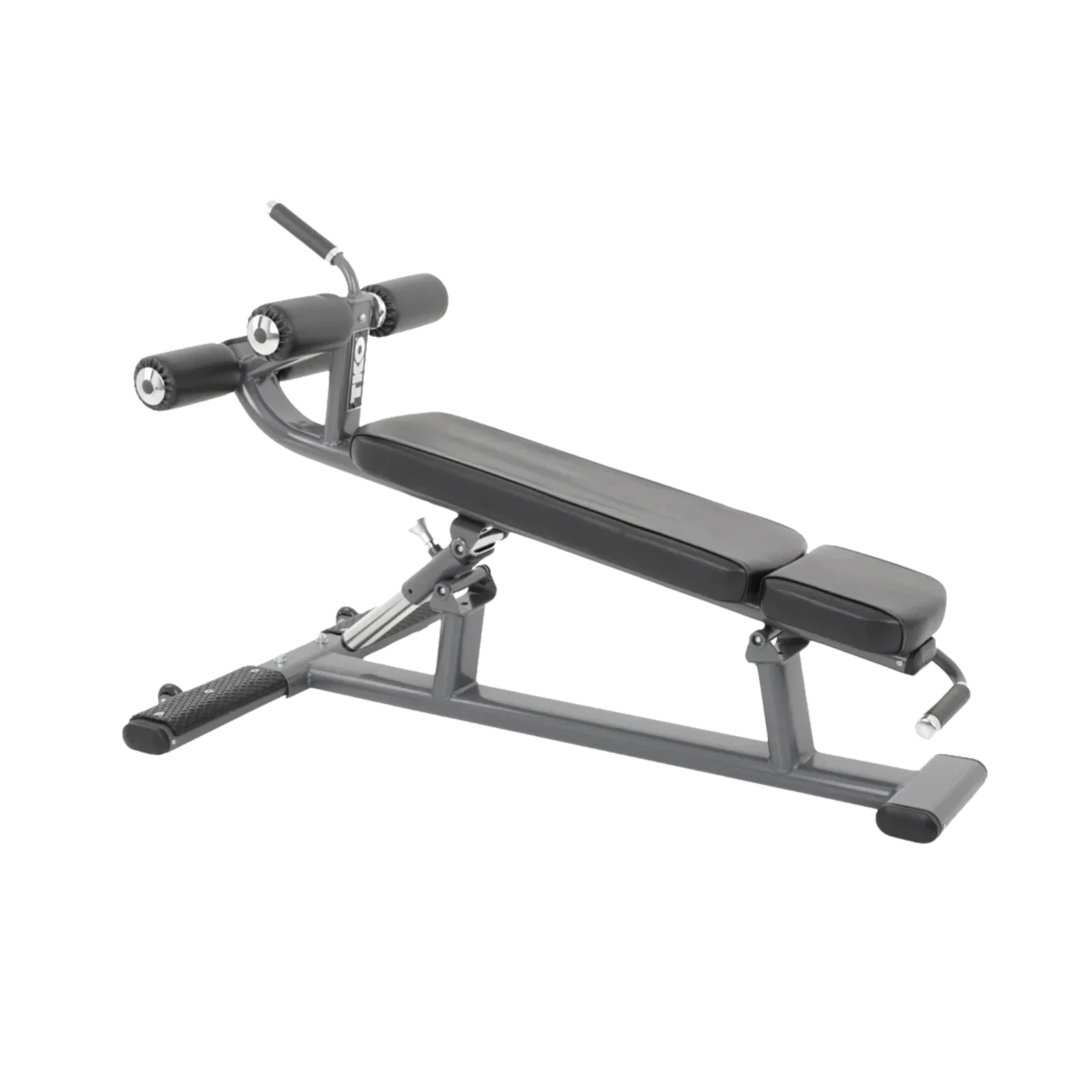 An individual performing an abdominal crunch or sit-up on the TKO Ab Crunch Bench, demonstrating correct form and the machine's intended use within a UAE fitness context. The user appears stable and supported, leveraging the bench's angle and padding for an effective core contraction. This visual illustrates how the abdominal workout bench facilitates targeted training for achieving toned abs and a strong core, popular fitness goals for people exercising in Dubai, Abu Dhabi, or Sharjah gyms and homes (TKO Fitness AED).