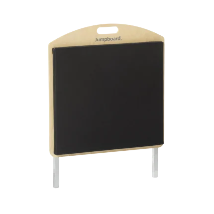 Official Merrithew V2 Max Jumpboard accessory shown against a clean background. Features high-density black EVA foam padding and strong tubular steel frame. Essential Stott Pilates equipment for UAE studios adding cardio reformer workouts in Dubai.