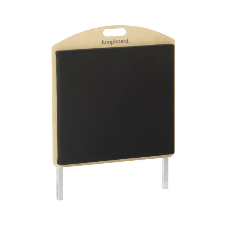 Official Merrithew V2 Max Jumpboard accessory shown against a clean background. Features high-density black EVA foam padding and strong tubular steel frame. Essential Stott Pilates equipment for UAE studios adding cardio reformer workouts in Dubai.
